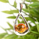 Honey amber in silver pendant Ag 925/1000
