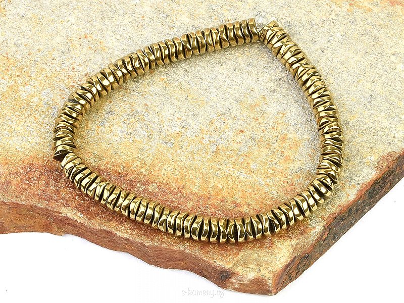 Hematite bracelet with gold lenses