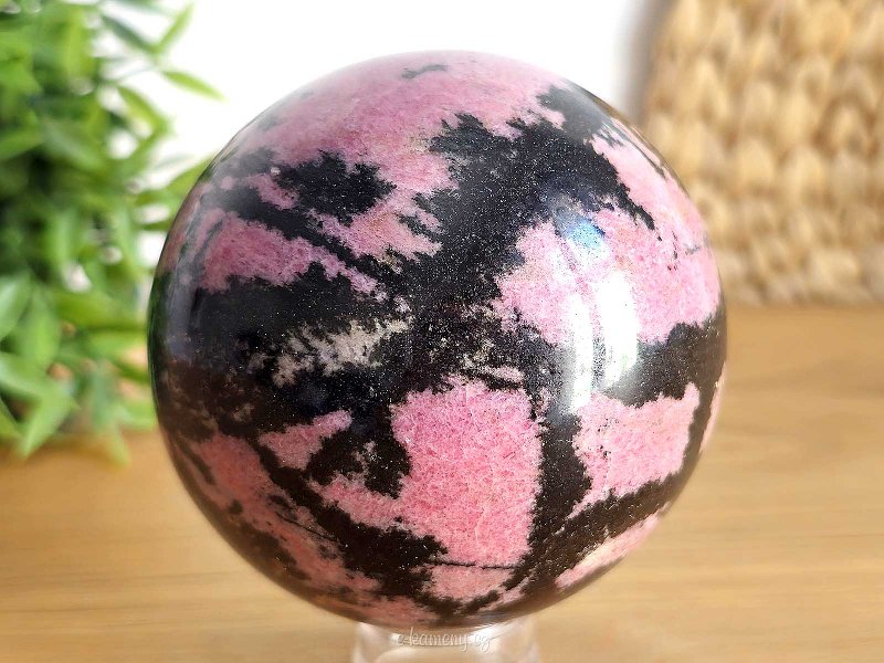 Smooth ball of rhodonite stone 1256g