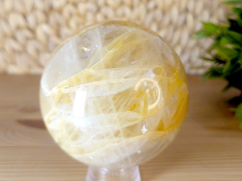 Crystal stone with limonite in the shape of a sphere with a diameter of 8.0 cm