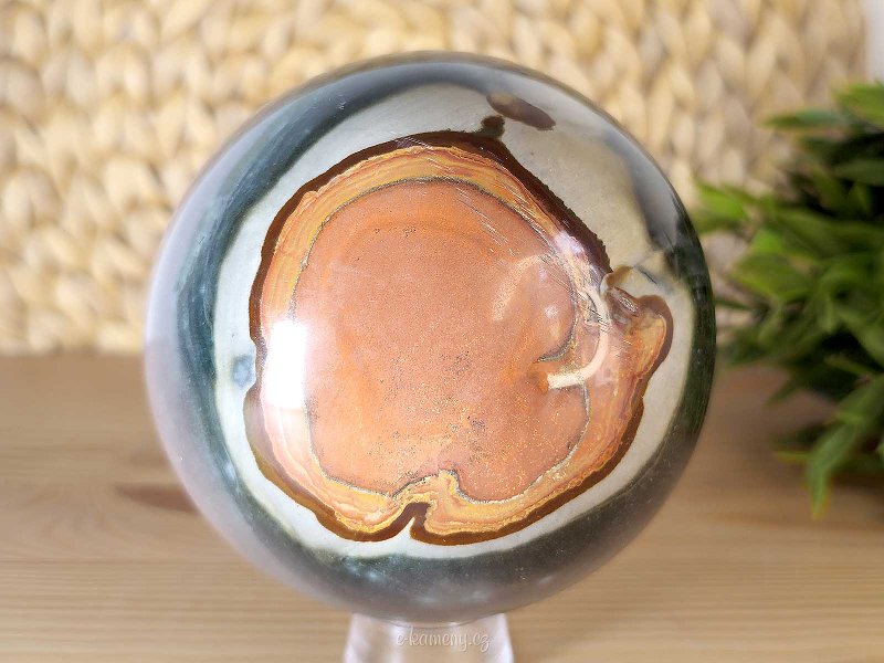 Colorful jasper stone in the shape of a ball with a diameter of 9.8 cm