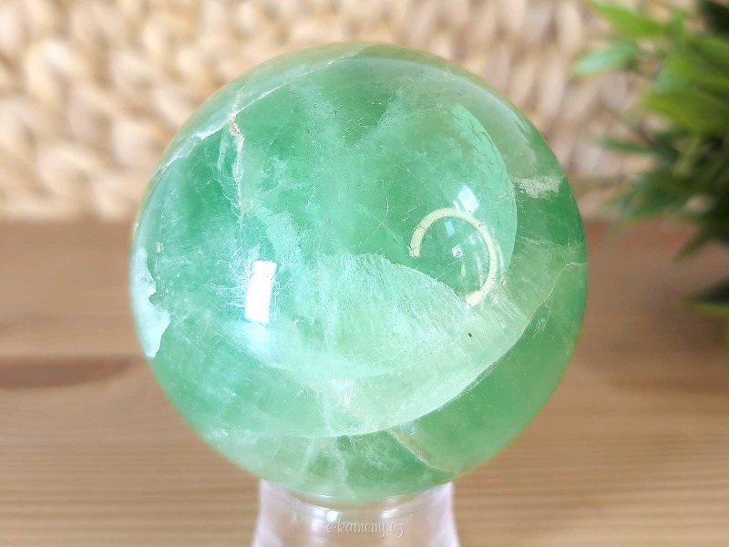 Green fluorite stone in the shape of a ball with a diameter of 6.4 cm