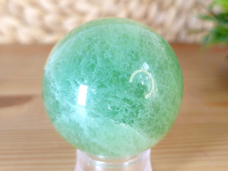 Green fluorite stone in the shape of a ball with a diameter of 5.2 cm