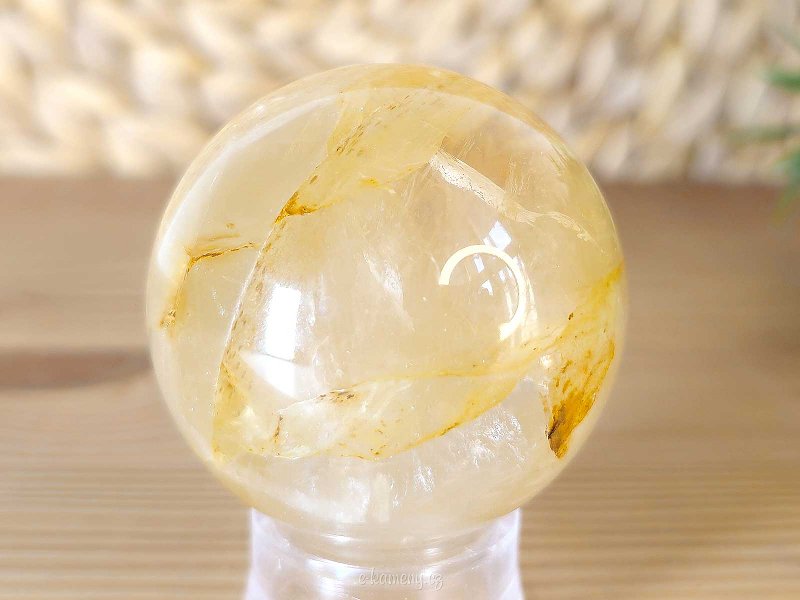 Crystal stone with limonite in the shape of a ball with a diameter of 4.9 cm