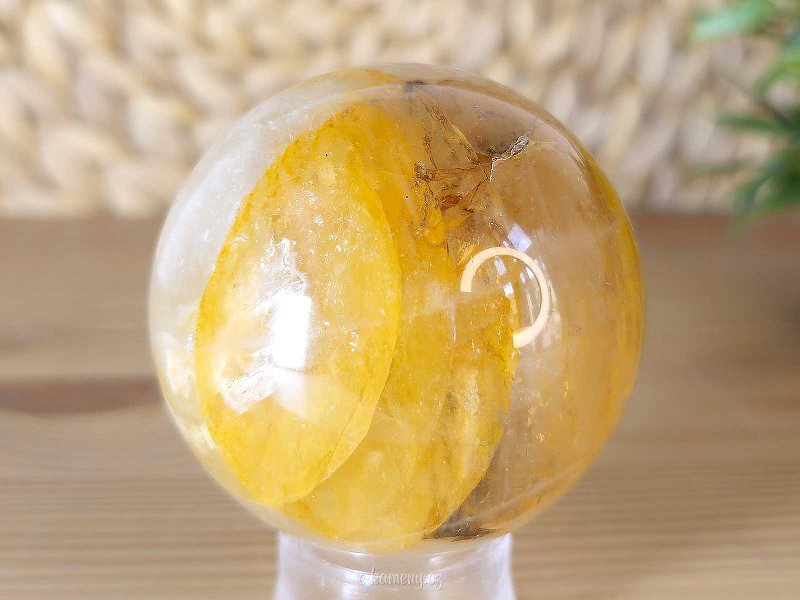 Crystal stone with limonite in the shape of a ball with a diameter of 5.8 cm