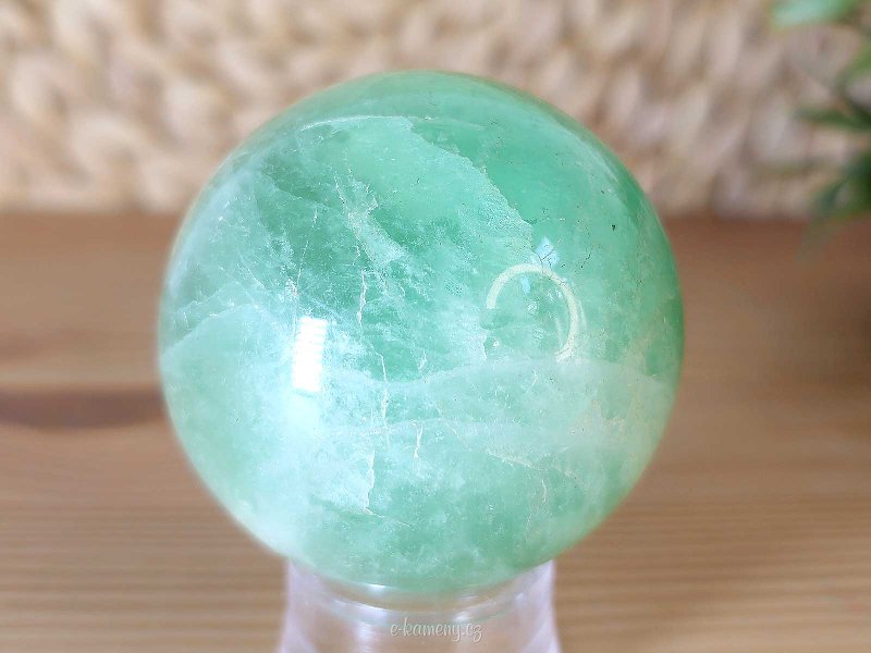 Green fluorite stone in the shape of a ball with a diameter of 5.3 cm