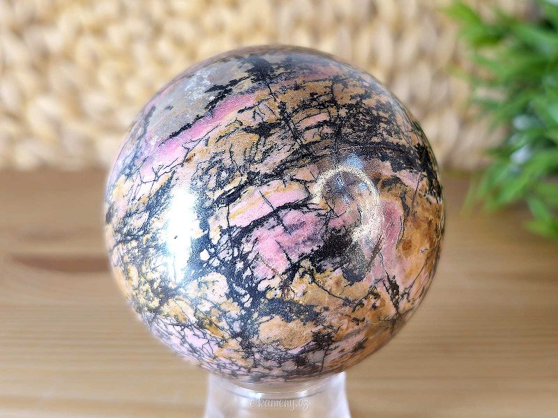 Rhodonite stone in the shape of a ball with a diameter of 6.9 cm