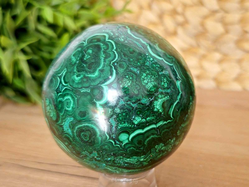 Malachite stone in the shape of a ball with a diameter of 7.4 cm