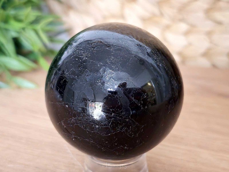 Black tourmaline stone in the shape of a sphere with a diameter of 5.9 cm