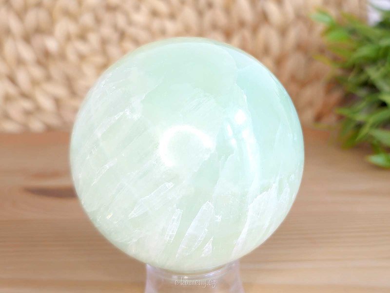 Pistachio calcite stone in the shape of a ball 473 grams