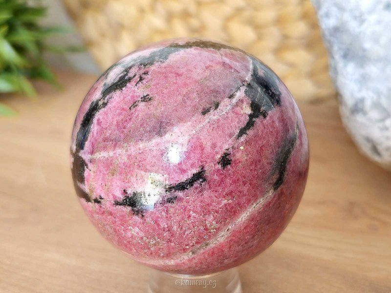 Rhodonite stone in the shape of a ball 668 grams