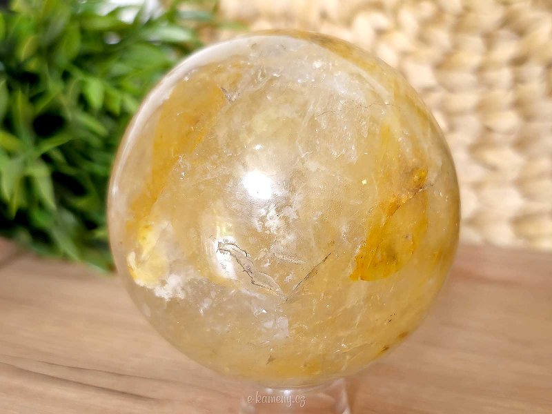 Crystal stone with limonite in the shape of a ball 1040 grams