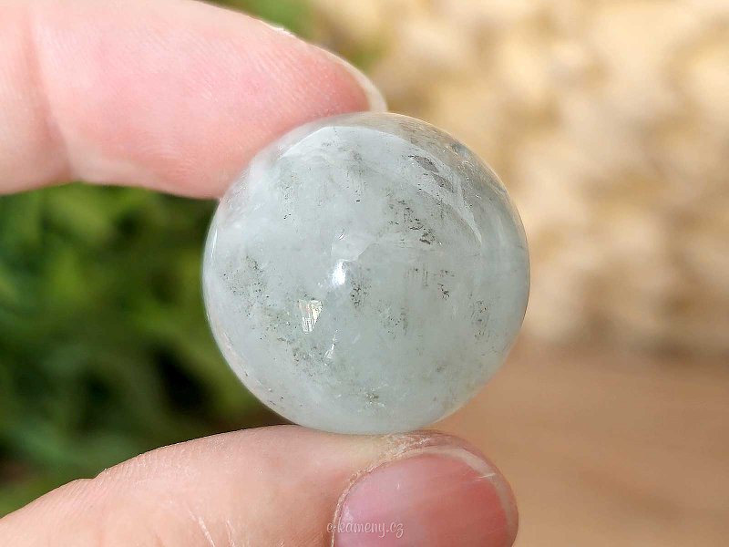 Aquamarine stone with tourmaline in the shape of a sphere with a diameter of 2.4 cm