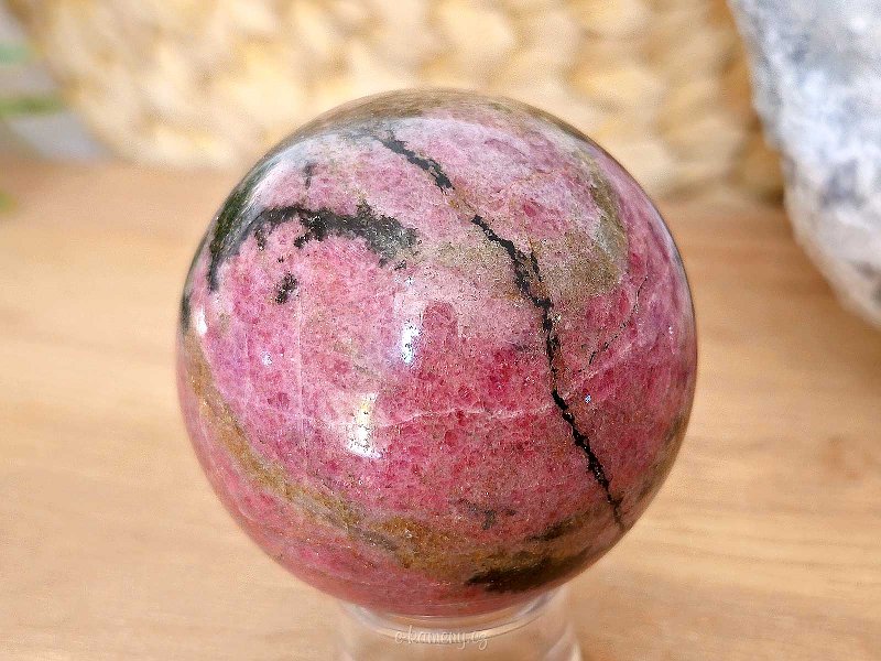 Rhodonite stone in the shape of a ball 390 grams