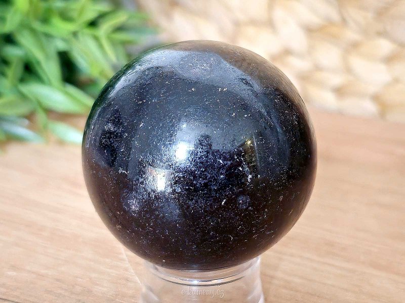 Black tourmaline stone in the shape of a ball 253 grams