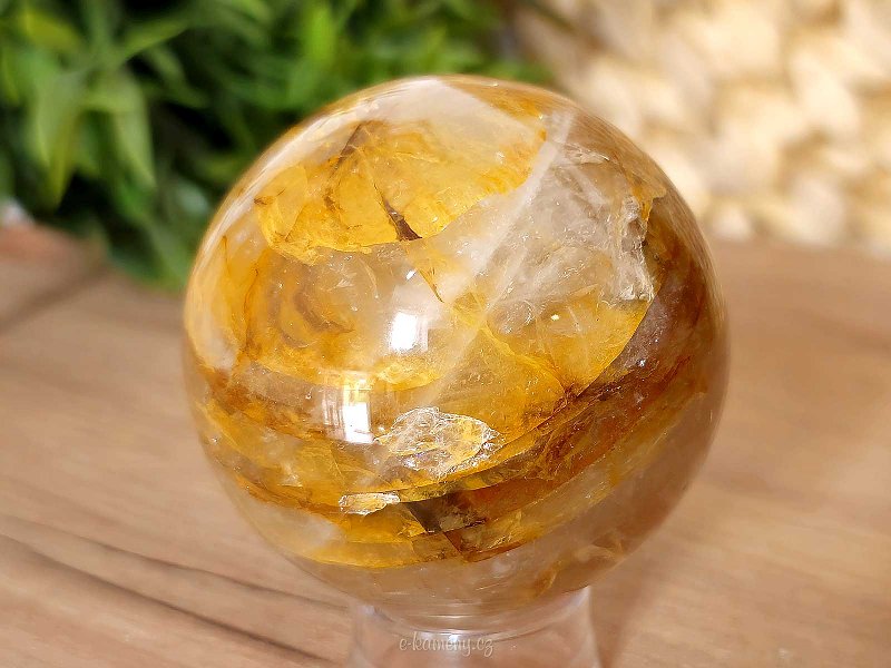 Crystal stone with limonite in the shape of a ball 312 grams