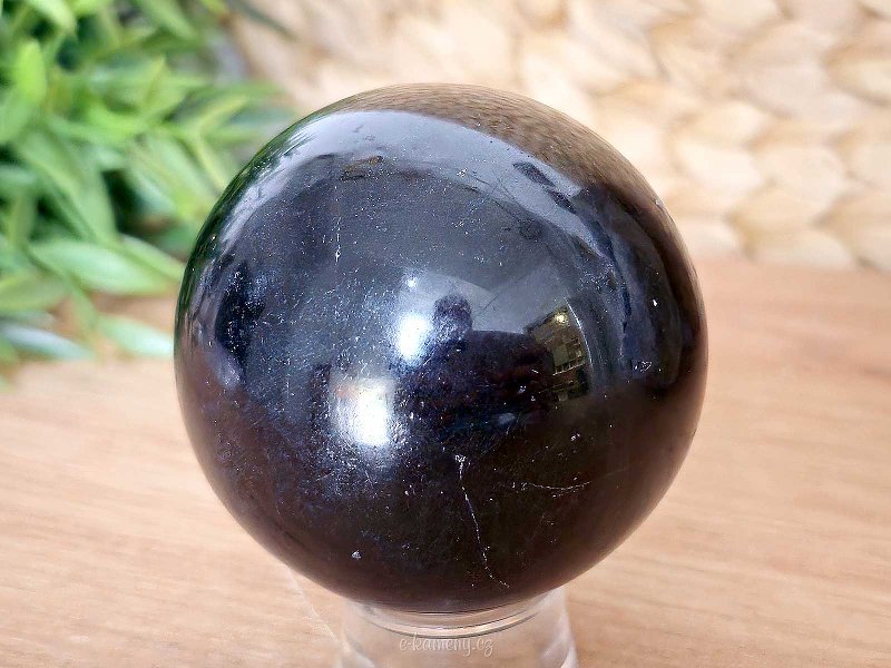 Black tourmaline stone in the shape of a ball with a diameter of 6.4 cm