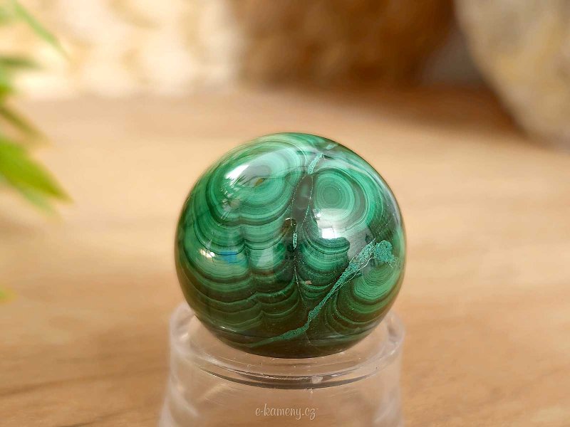 Malachite stone in the shape of a smooth ball 45 grams