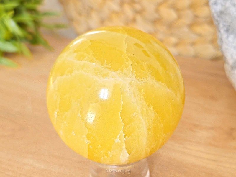 Lemon calcite stone in the shape of a ball 424 grams