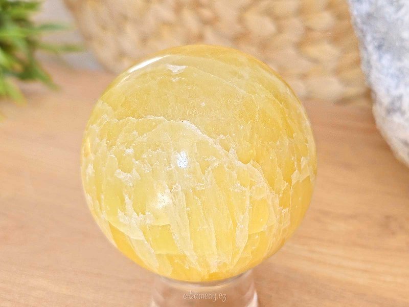 Lemon calcite stone in the shape of a sphere 387 grams