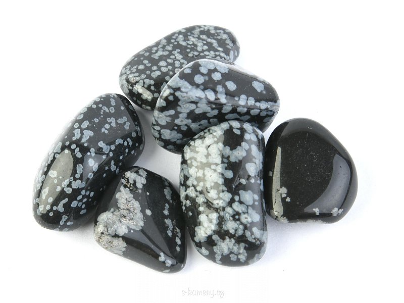 Stone obsidian flake of about 2.5 cm - 3cm