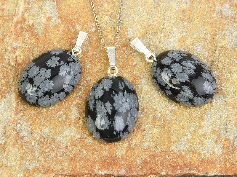 Flake obsidian pendant in the shape of an oval Ag