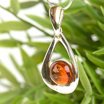 Amber in the shape of a ball in a silver pendant Ag 925/1000