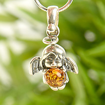 Angel pendant holding amber in the shape of a ball Ag 925/1000