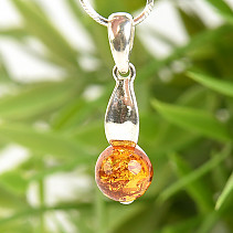 Amber in the shape of a ball in a pendant Ag 925/1000