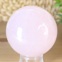 A semi-precious stone in the shape of a sphere with a diameter of 6.0 cm