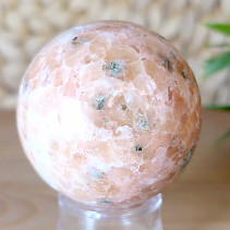 Orange calcite stone in the shape of a ball with a diameter of 5 cm