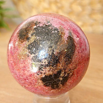 Rhodonite stone in the shape of a ball 455 grams