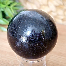 Black tourmaline stone in the shape of a ball 253 grams