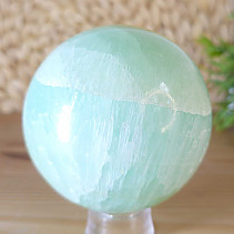 Pistachio calcite stone in the shape of a ball 843 grams