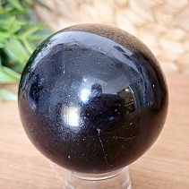 Black tourmaline stone in the shape of a ball with a diameter of 6.4 cm