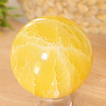 Lemon calcite stone in the shape of a ball 424 grams