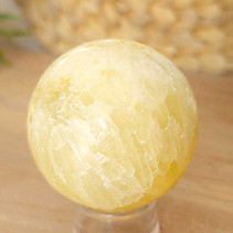 Lemon calcite stone in the shape of a ball 264 grams