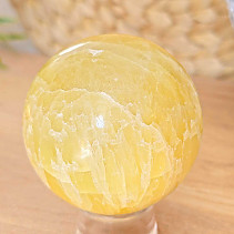 Lemon calcite stone in the shape of a sphere 387 grams