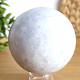 Polished ball of blue calcite 7.9 cm