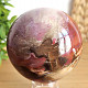 Petrified wood in the shape of a smooth ball 683g