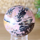 Rhodonite stone in the shape of a ball with a diameter of 5.2 cm