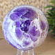 Chevron amethyst stone in the shape of a sphere with a diameter of 7.6 cm