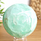 A smooth ball of fluorite stone with a diameter of 7.3 cm