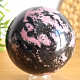 Smooth ball of rhodonite stone 1256g