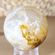 Crystal stone with limonite in the shape of a sphere with a diameter of 5.0 cm