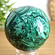 Malachite stone in the shape of a ball with a diameter of 5.7 cm