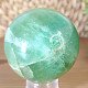 Green fluorite stone in the shape of a ball with a diameter of 6.4 cm