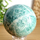 Green aventurine stone in the shape of a ball with a diameter of 6.4 cm