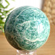 Green aventurine stone in the shape of a ball with a diameter of 6.4 cm