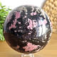 Rhodonite stone in the shape of a ball with a diameter of 10.5 cm